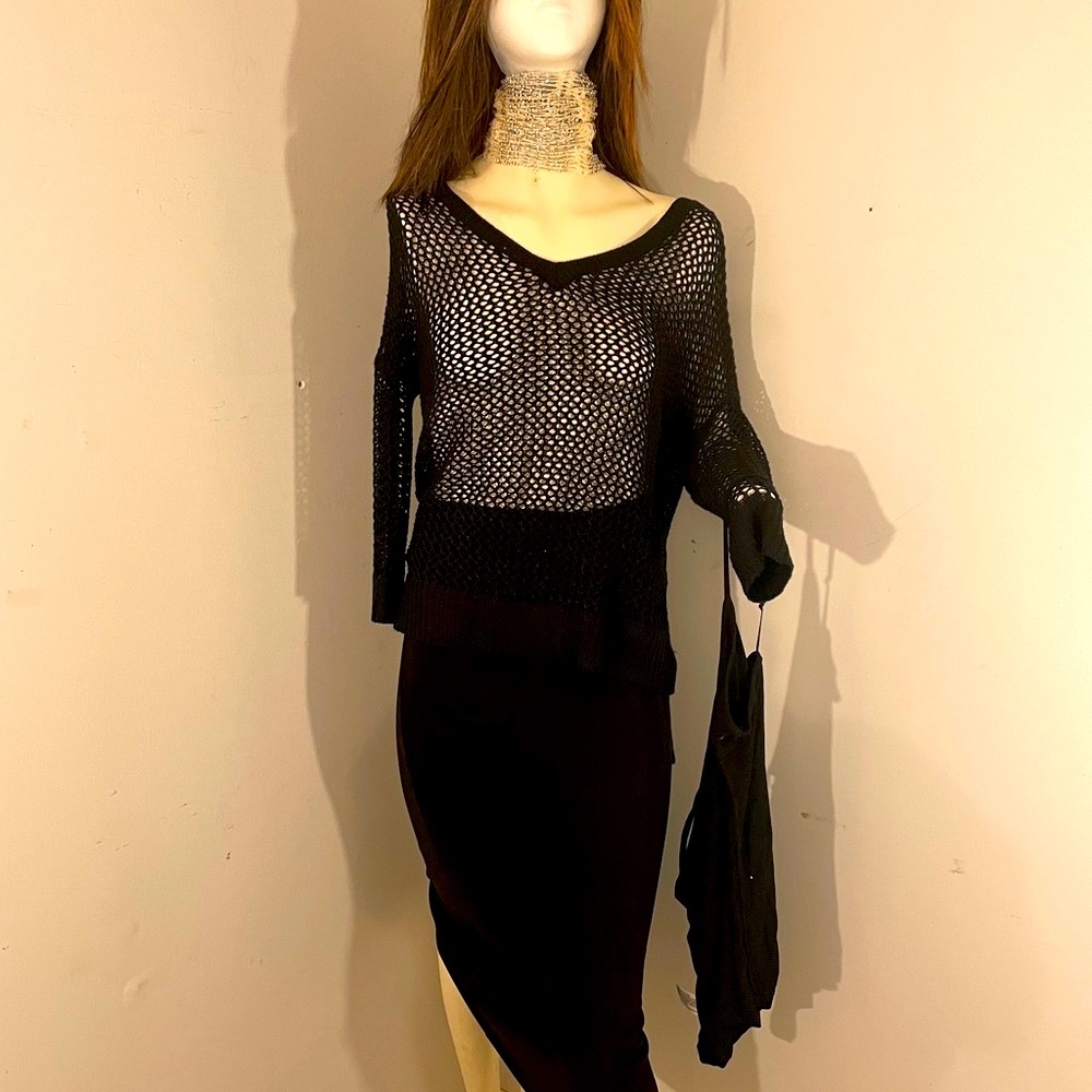 Rock and republic mesh top. On the back it has a skull sewn on.